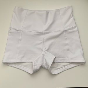 White Fabletics booty shorts